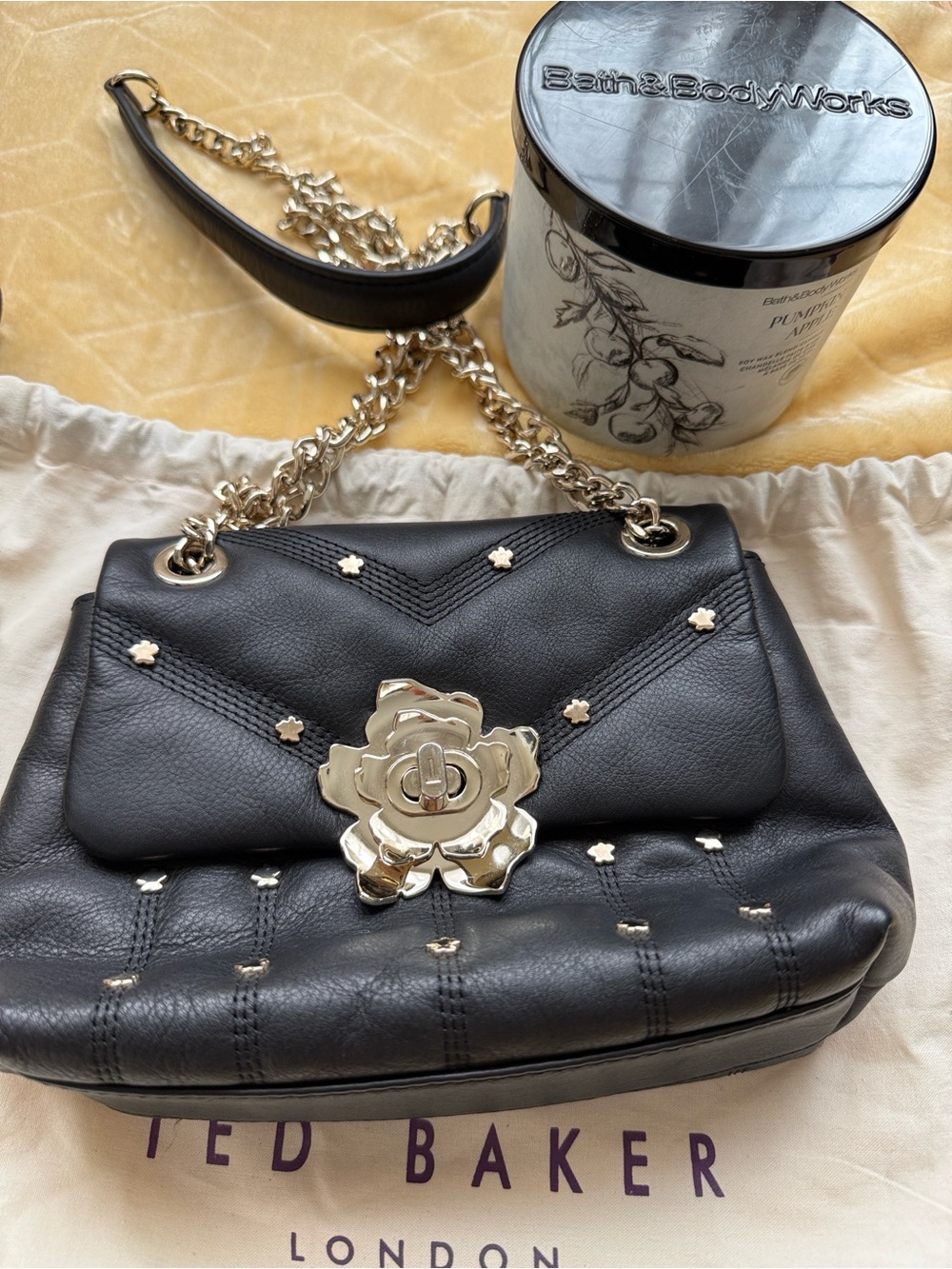 Ted Baker Black Leather Shoulder Bag with Gold Floral Turn-Lock